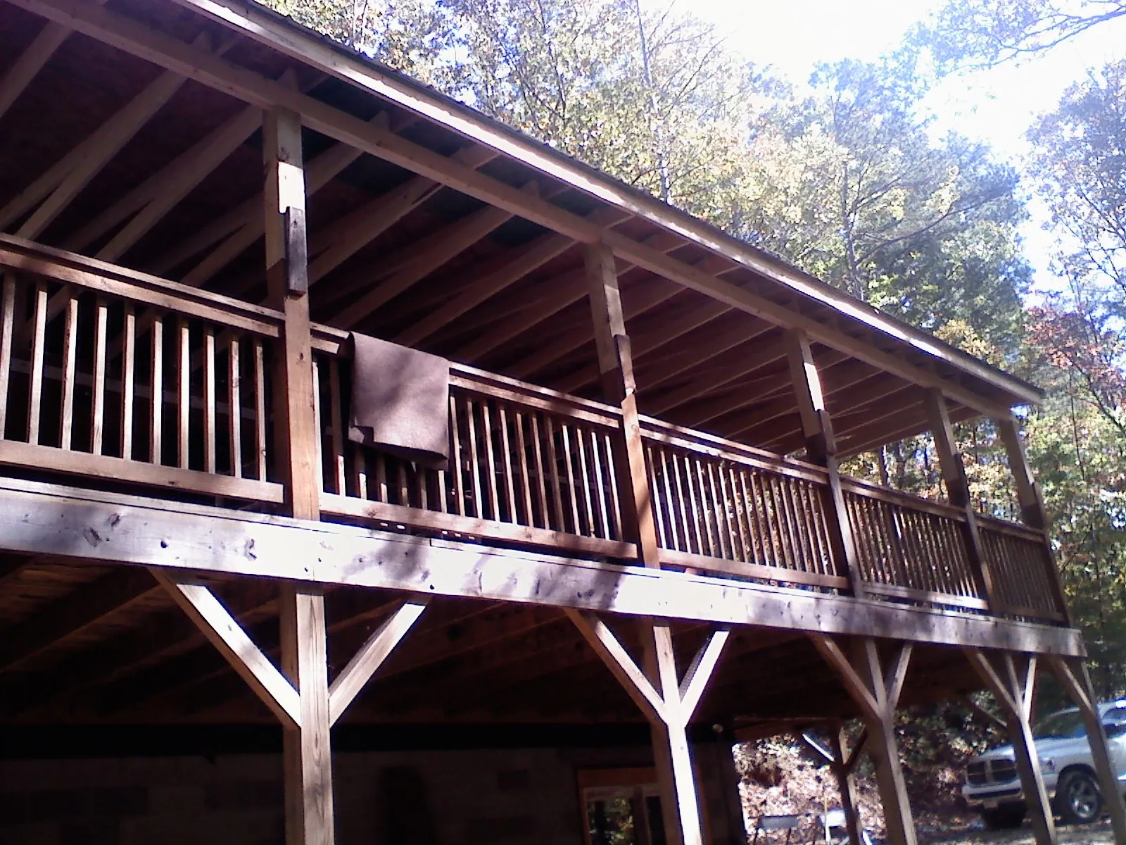 Timber framing under a new elevated porch and deck — Roof Leak Repair in Custer by Roofing Brothers